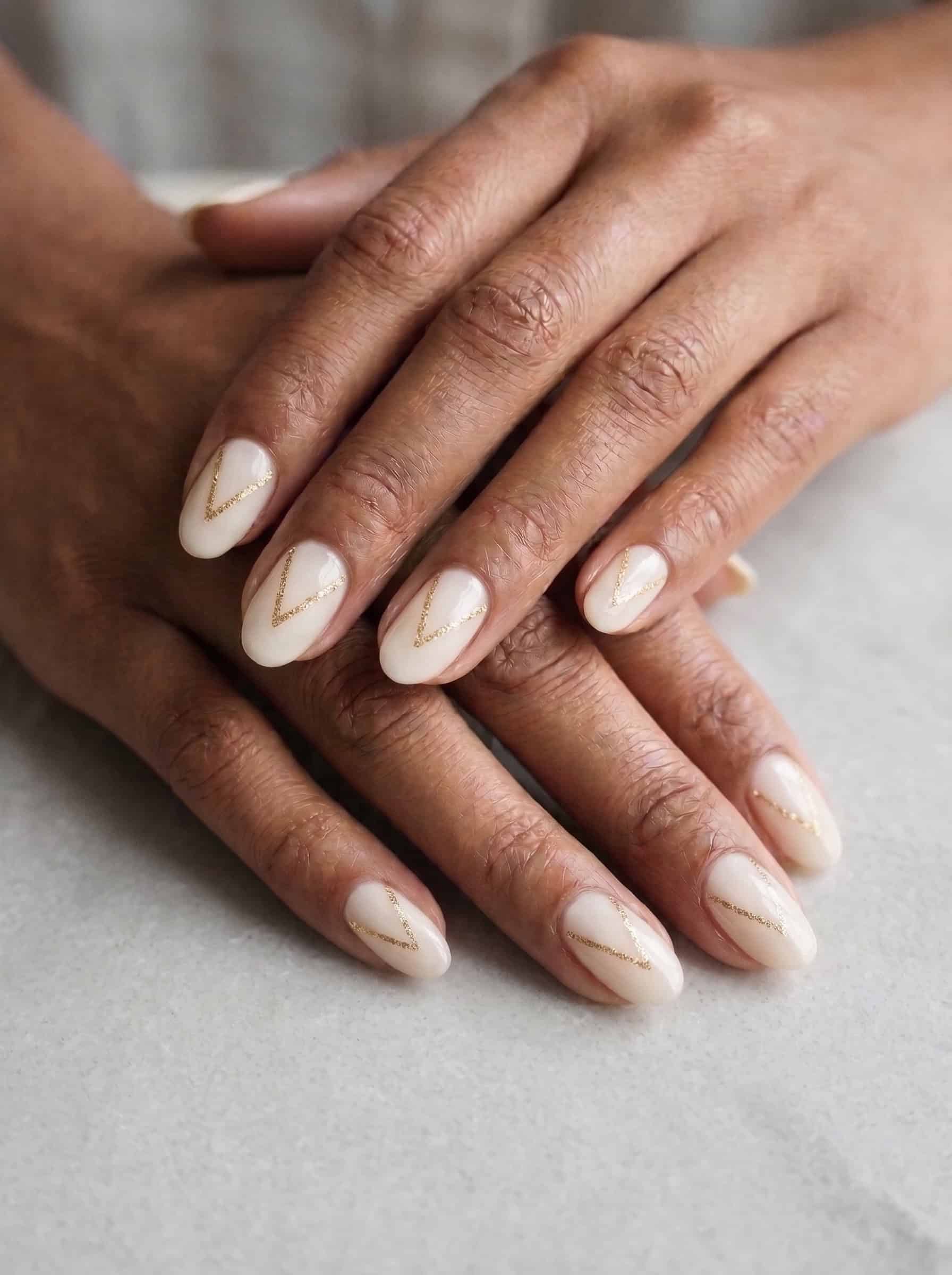 Ivory Nails With Fine Gold Lines